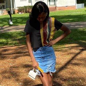 Purse , shirt , skirt